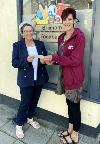Our President handing over a cheque for £460 to Brixham Foodbank