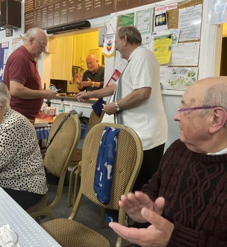 John Hudson collects his winnings!